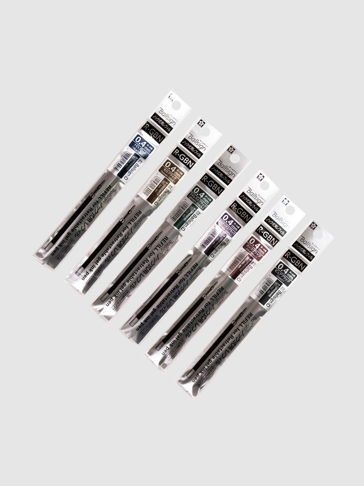 Sakura Ballsign iD Gel Ink Refill, 0.4 mm, Cloth and Paper. All six colors of refills in their packaging, lined up next to each other, turned slightly to the right against a neutral background.