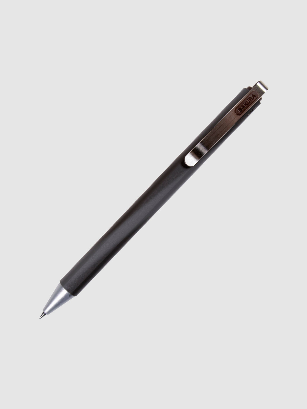 Pen in Brown Black turned to the right against a neutral background.