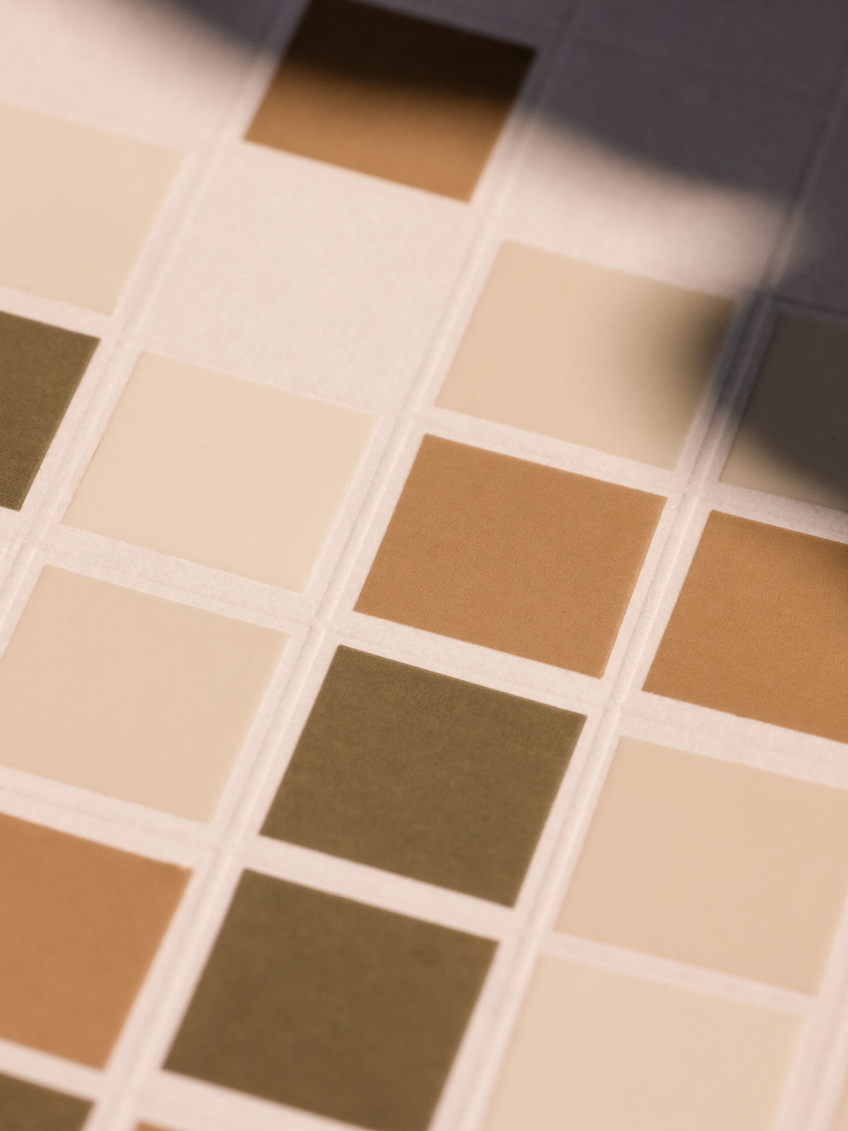 Close-up of Square Stickers featuring a neutral palette of beige, brown, and olive green tones on a transparent background.