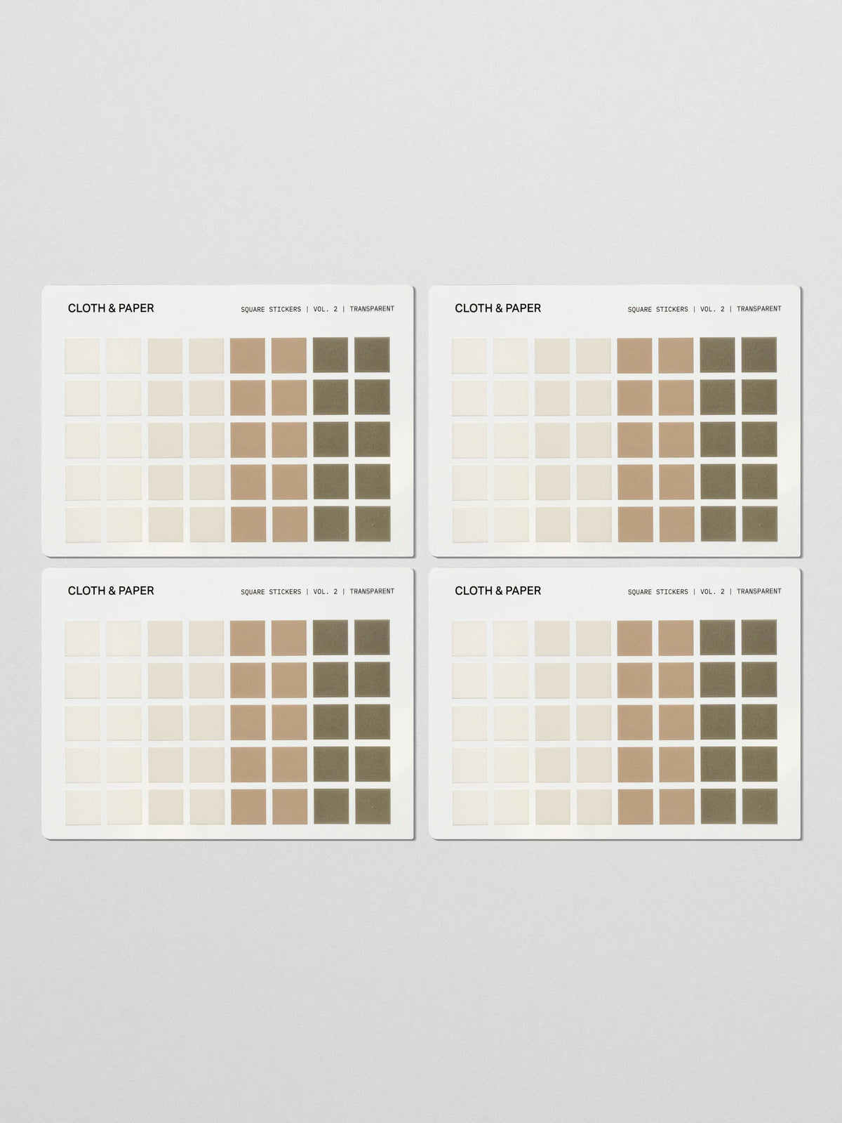 Four sticker sheets of Square Stickers Vol. 2 laid flat, displaying a grid of earth-toned squares in an ombré arrangement.