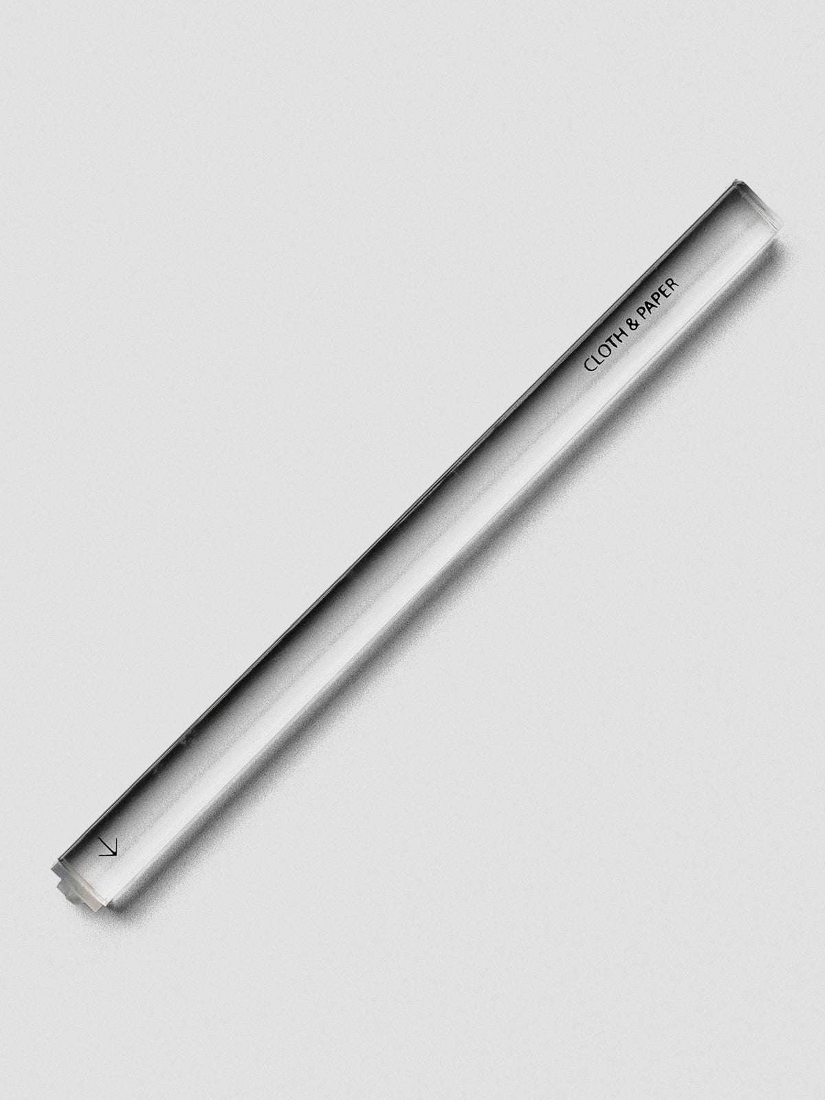 Single clear acrylic stamp stick with an arrow icon on the end and the Cloth & Paper logo on the side.