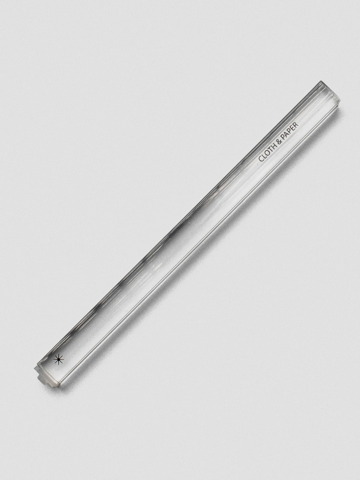 Single clear acrylic stamp stick with an asterisk symbol on top and the Cloth & Paper logo on the side.