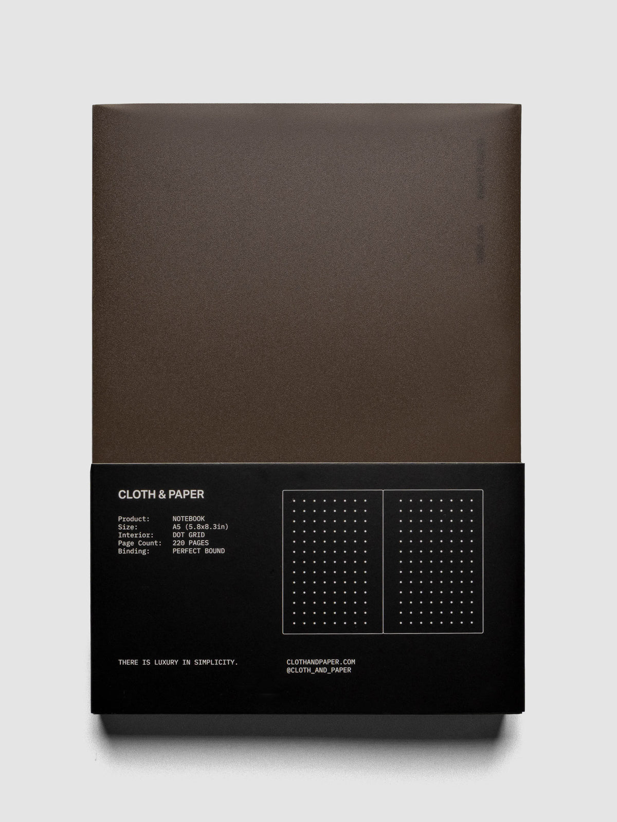 Perfect Bound Notebook | A5 | Dot Grid | Avant Garde shown closed, laying flat on a neutral background.