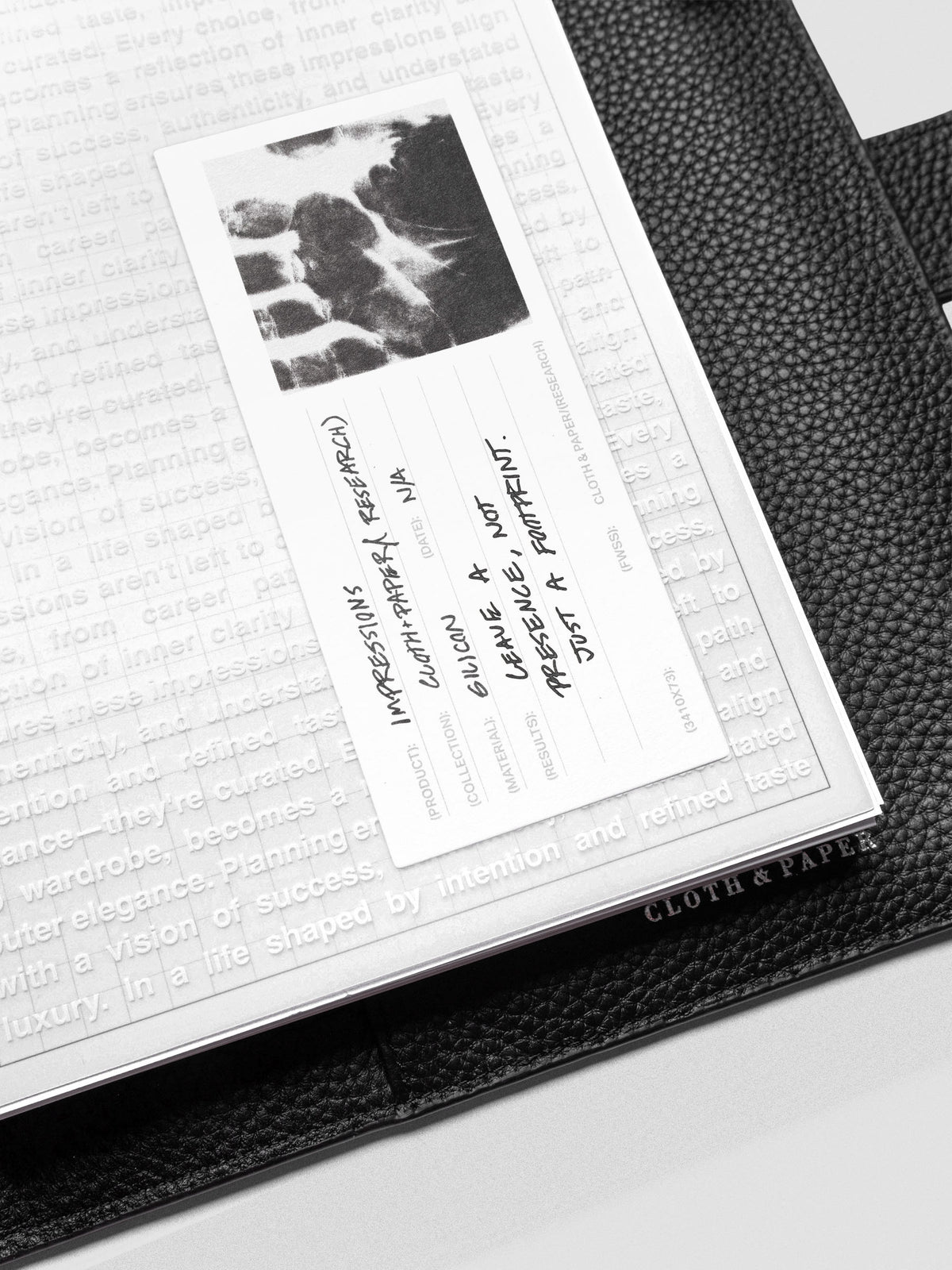 A5 Impressions Dashboard displayed on a desk surface with neutral accessories.