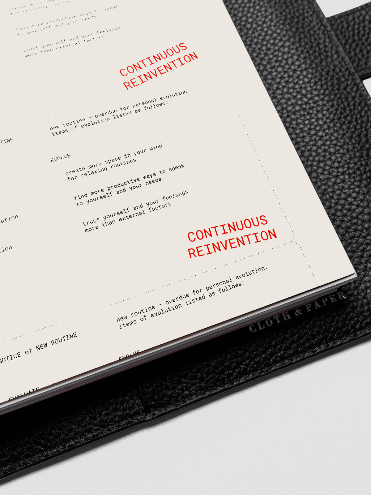 A5 Reinvention Dashboard styled in a flat lay with planner inserts and accessories.