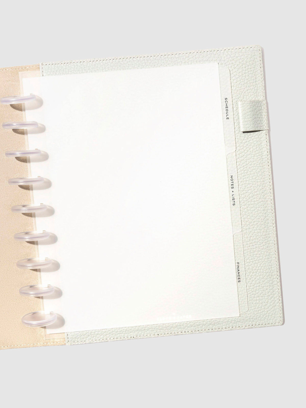 Black foil tabs displayed in use inside a leather folio.