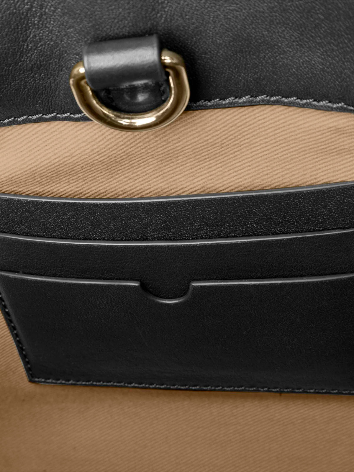 Closeup of credit card slots inside bag. Color shown is Padrillo.