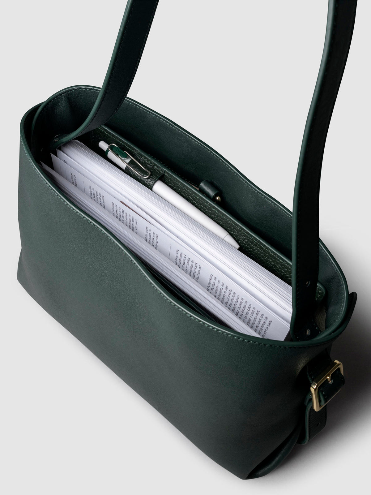 Bag shown from above with a planner inside of it. Color shown is Salamanca.
