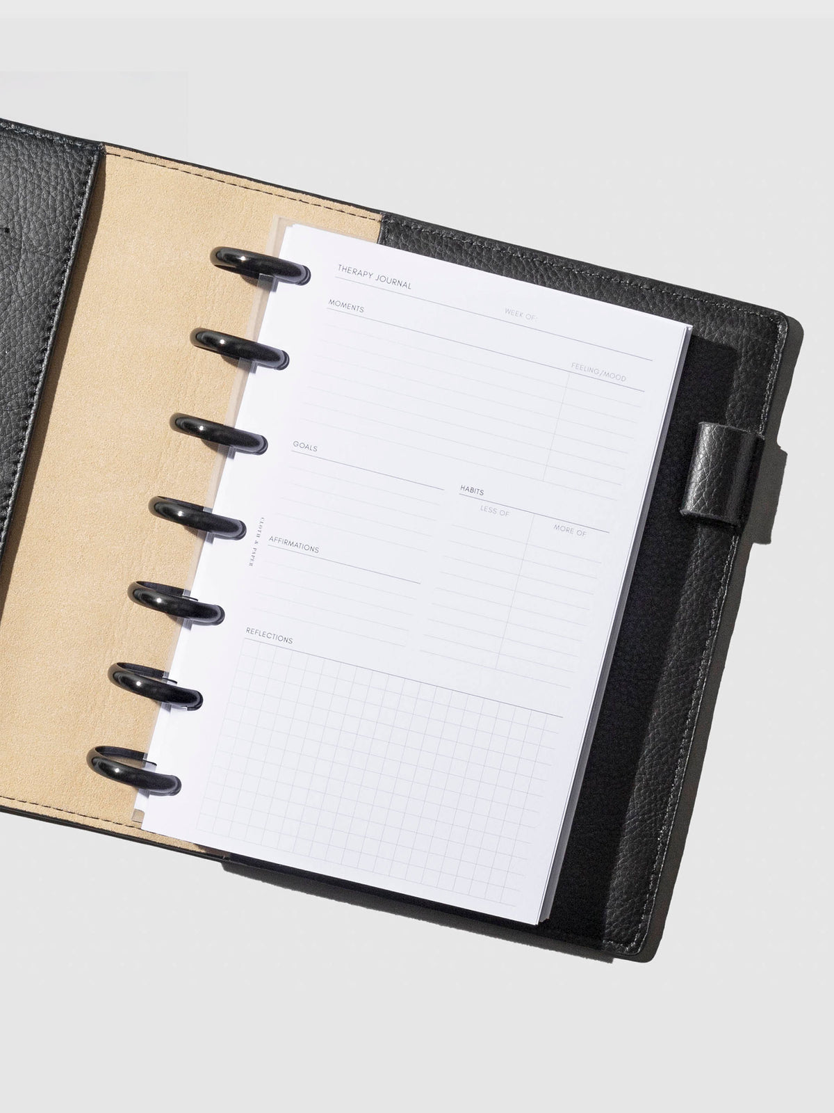 Insert shown in use inside a black leather agenda. Size shown is HP Mini.