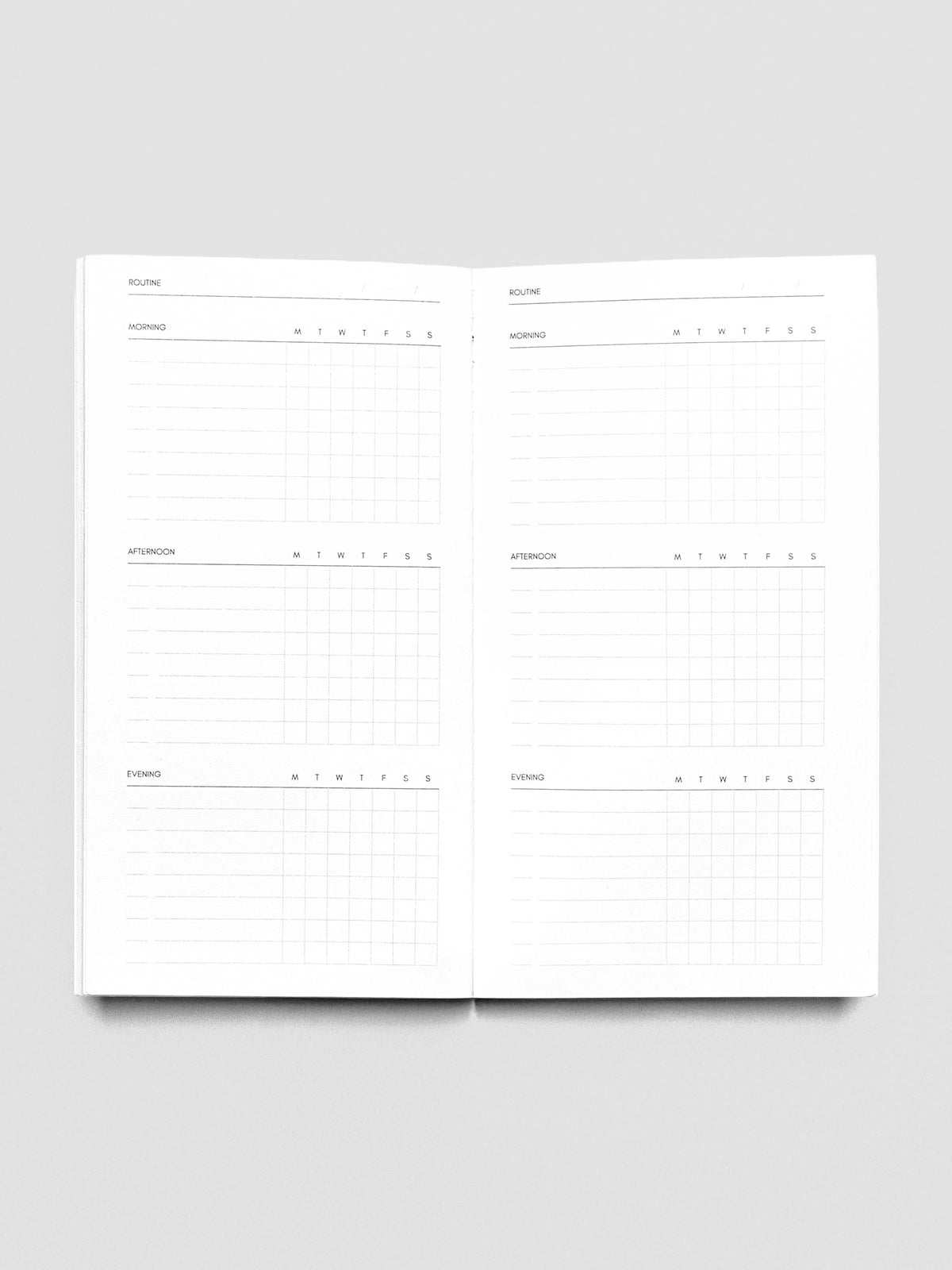 Pocket Plus Travel Notebook shown open displaying the Routine Builder pages.