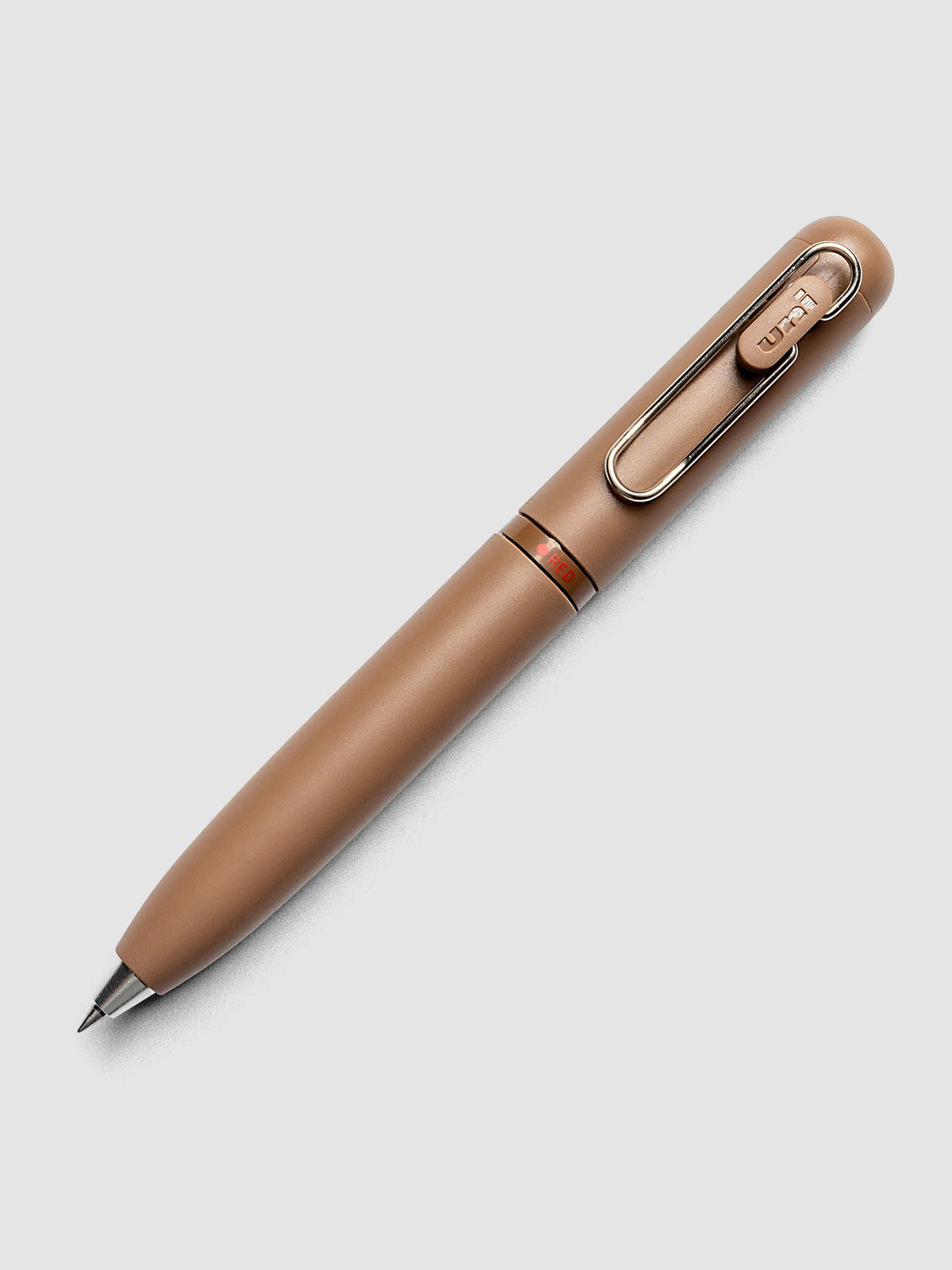 Uni-ball One 3-Color Ballpoint Pen in brown close up of barrel showing RED color indicator