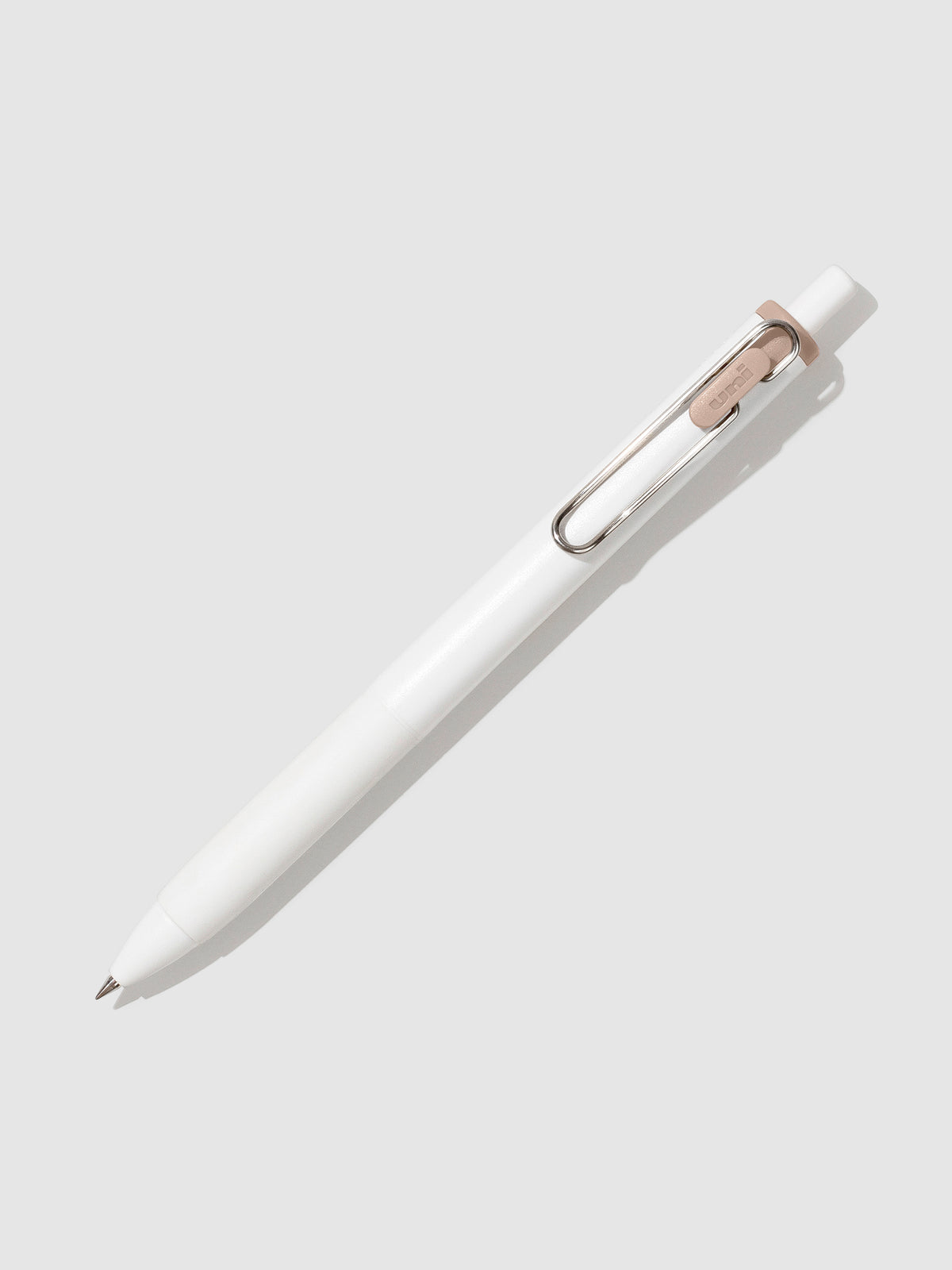 Pen tilted slightly to the right on a neutral background. Color pictured is Cappuccino Brown.
