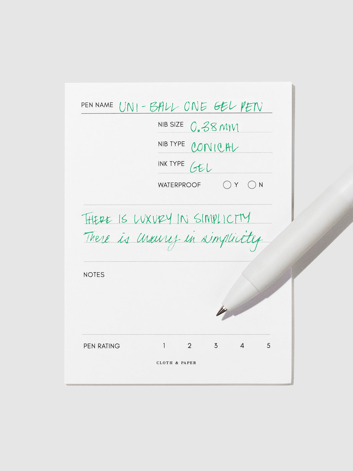 Pen tilted slightly to the right on a neutral background. Color pictured is Green.
