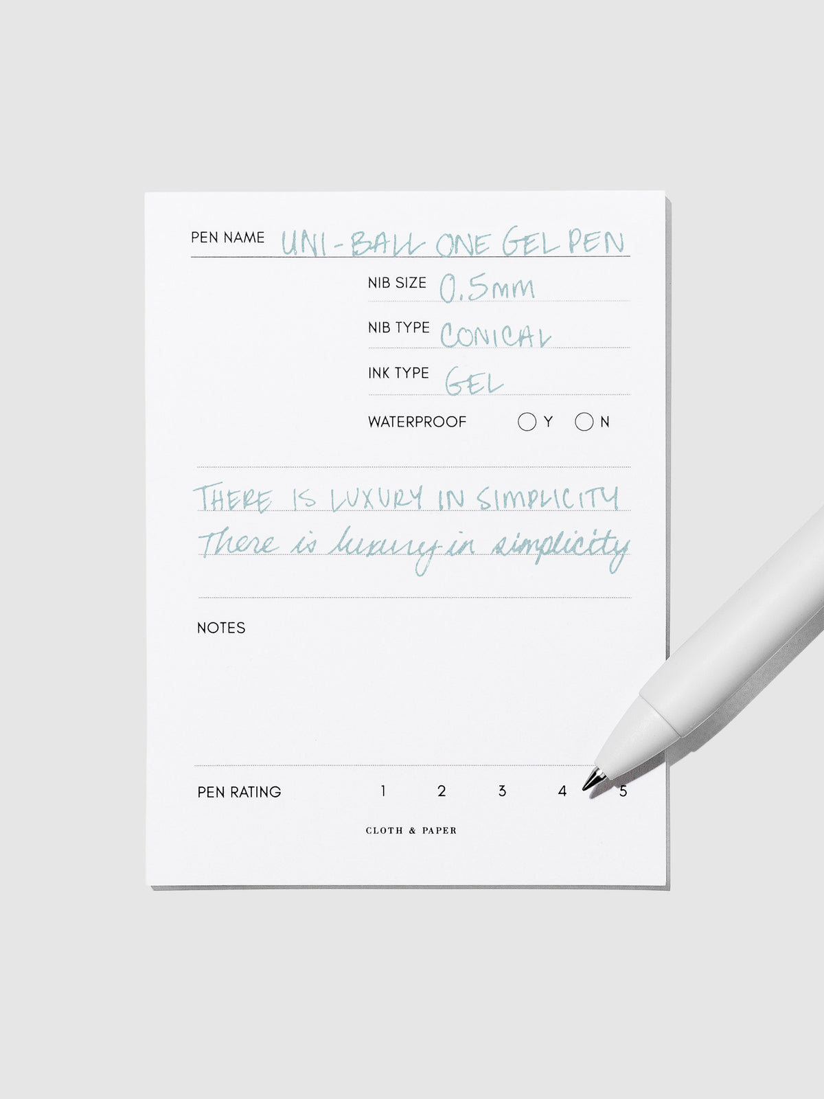 Pen tilted slightly to the right on a neutral background. Color pictured is Nemophilia Blue.