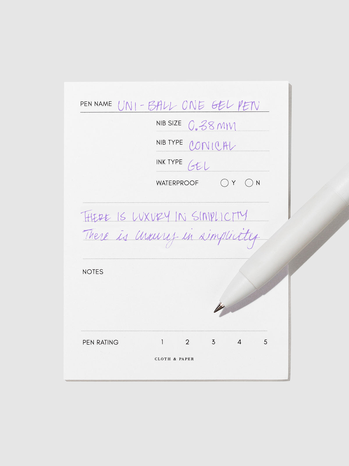Pen tilted slightly to the right on a neutral background. Color pictured is Twilight Purple.
