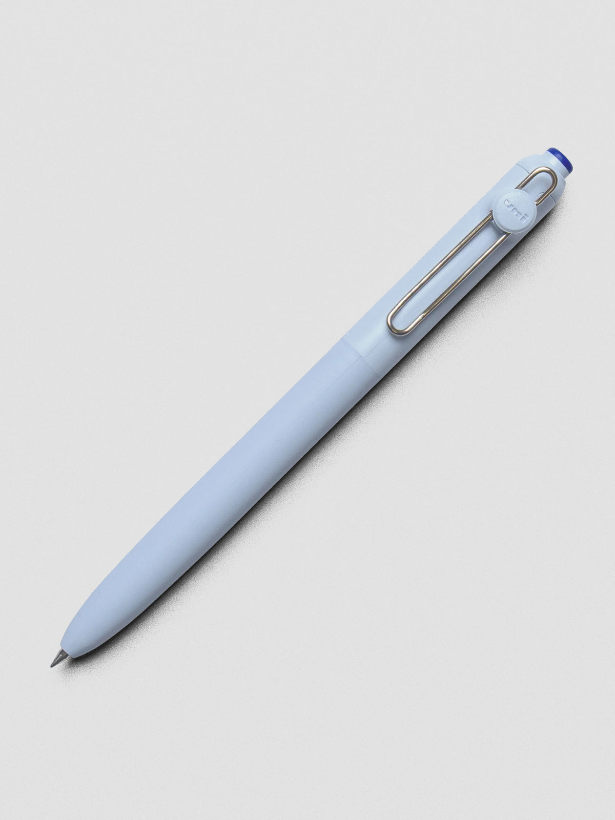 Blue pen shown at an angle with a silver clip.