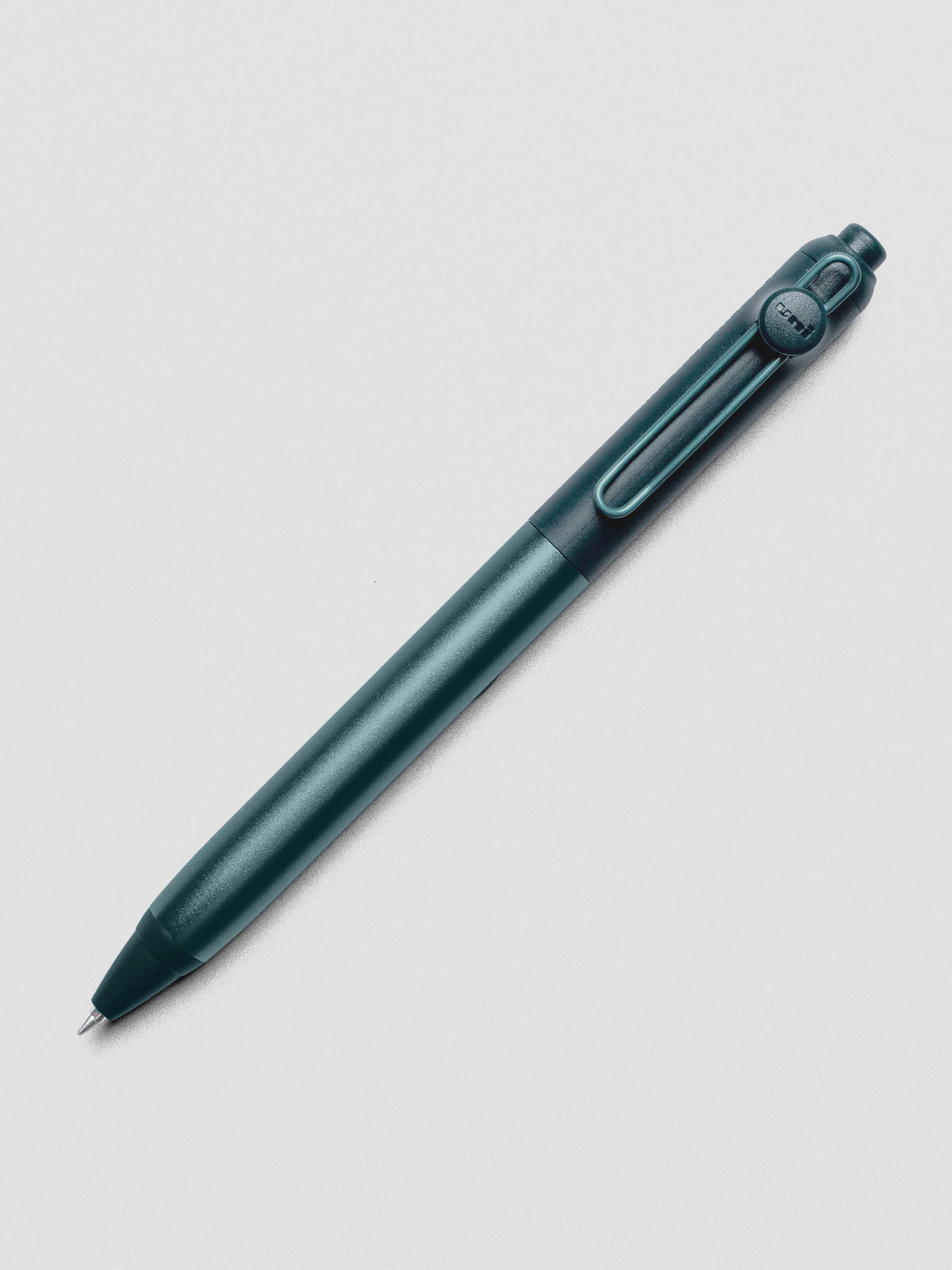 Dark green-blue pen shown at an angle on a grey background.