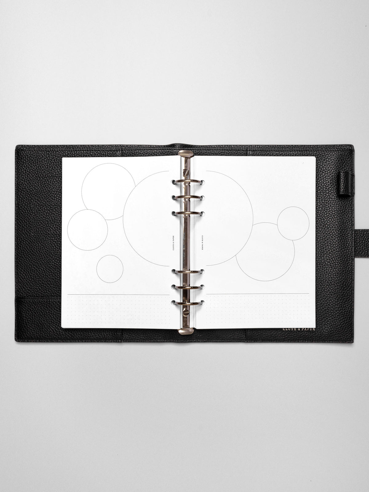 Insert in use inside a black leather planner.