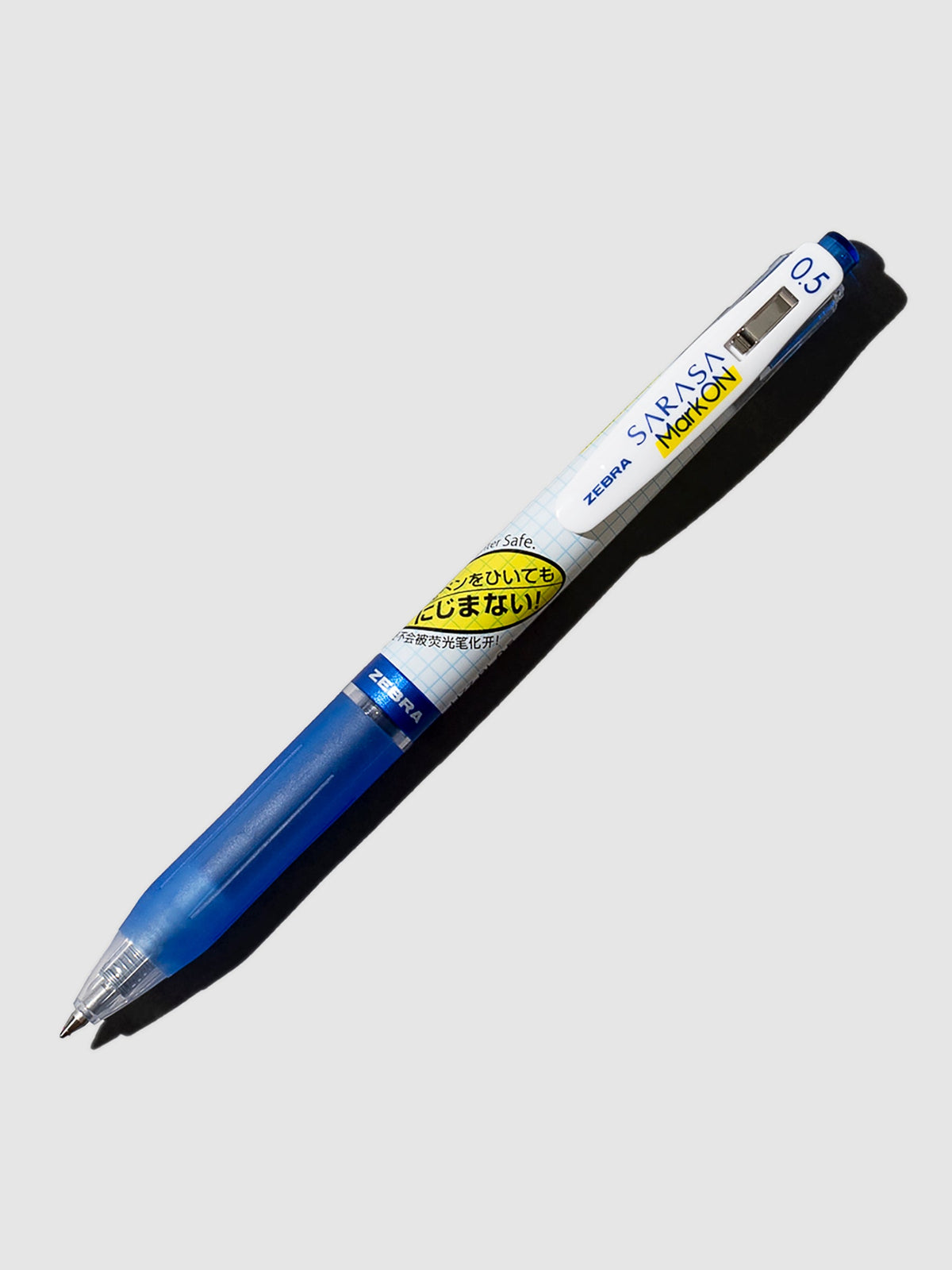 Blue pen turned to the right against a white background.
