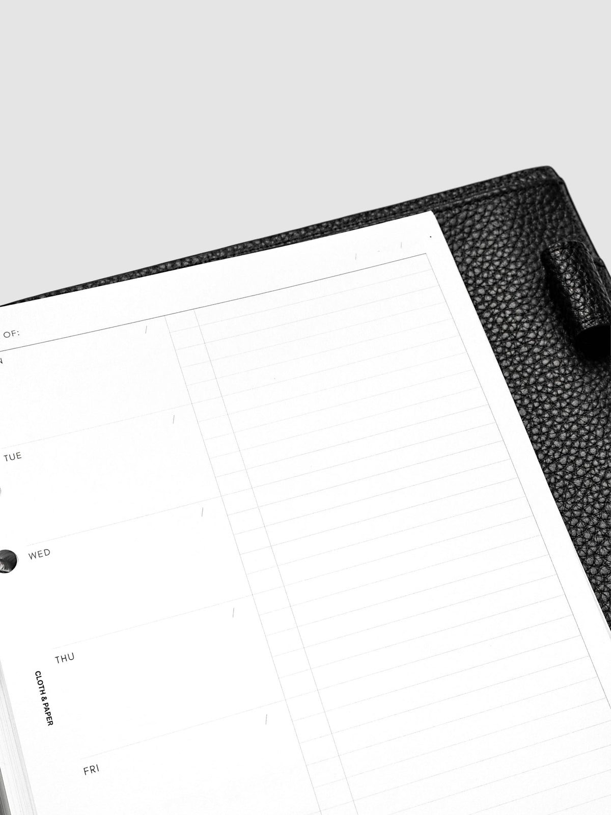 Close up view of the white planner inserts task column.