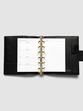 The Pocket Personal Curriculum Planner Inserts open in a black leather ring bound planner to the index spread, four skill entries with purpose and due date on the left and a lined notes page on the right