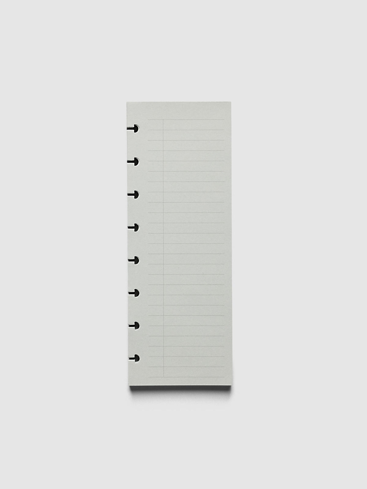 System Punch Pad, Half Letter 8-Disc Punch, pale grey pad of ruled task list sheets lying flat, disc notches along the left edge