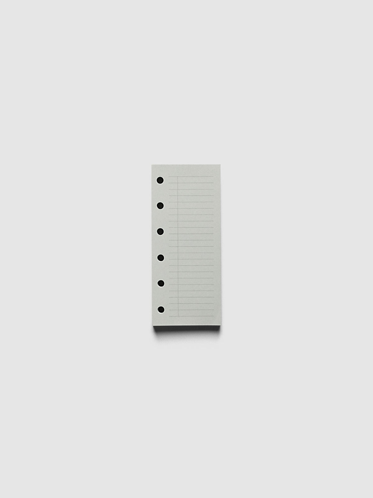 System Punch Pad, Pocket 6-Ring Punch, pale grey pad of ruled task list sheets lying flat, round ring holes along the left edge