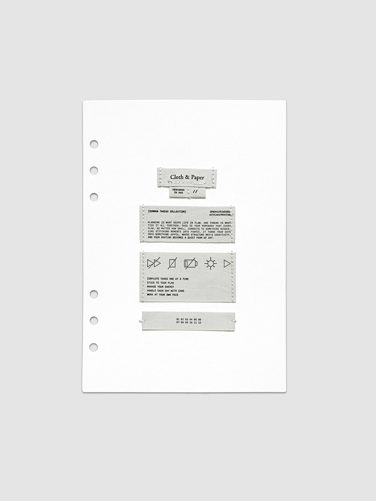 Sewn Tags Planner Dashboard shown pre-punched for 6-ring planners in size A5.