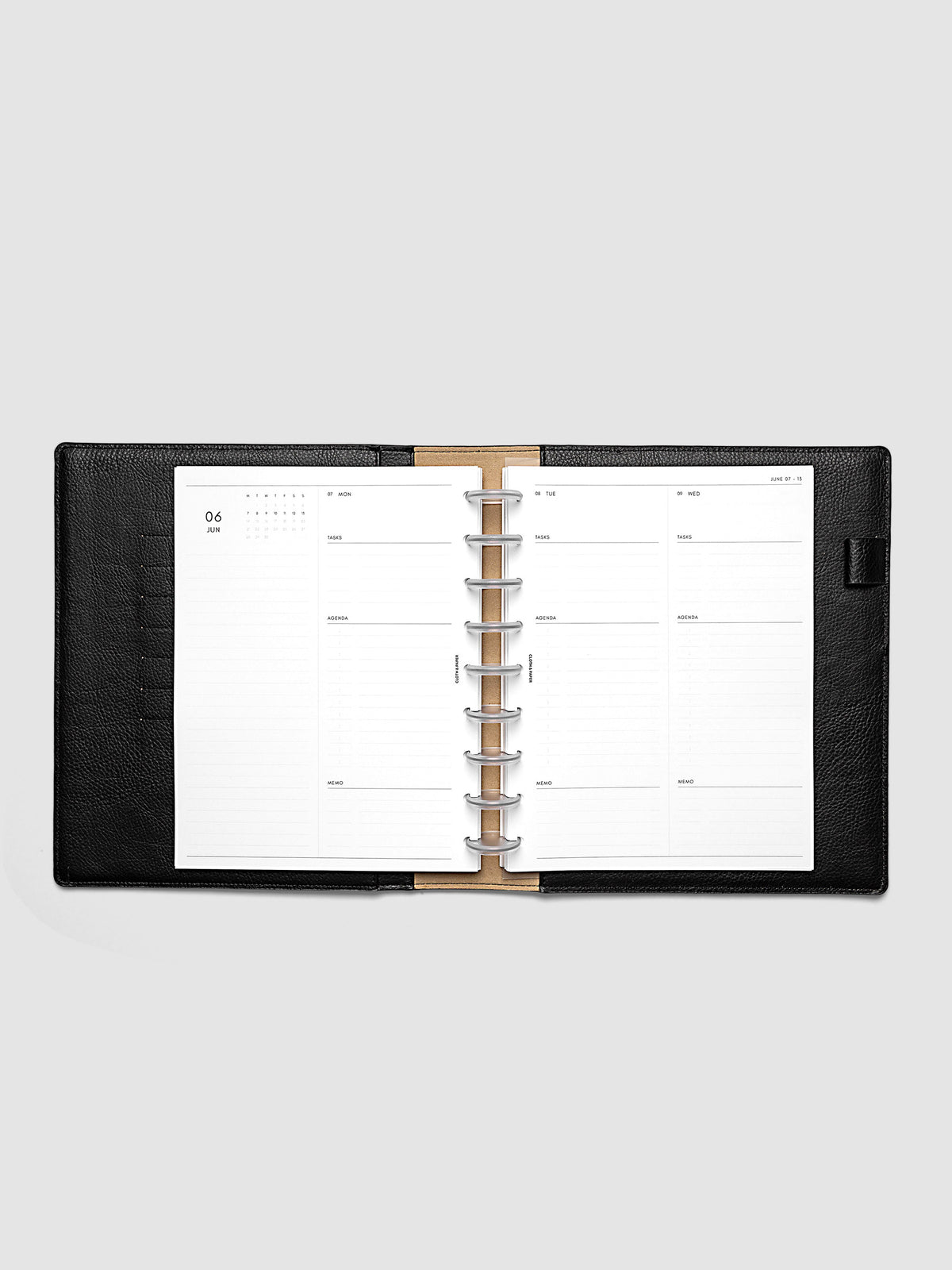 2027 Dated Daily Inserts | Monday Start in size HP Classic 9-Disc Punch inside a black planner cover