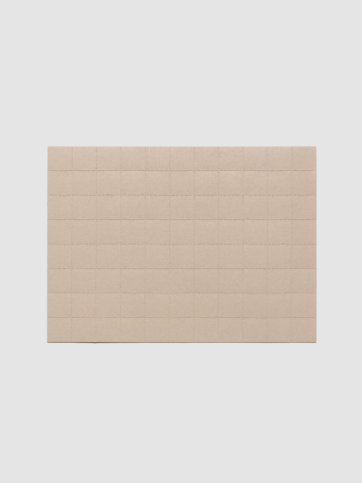 One sheet of beige tear-off stickers