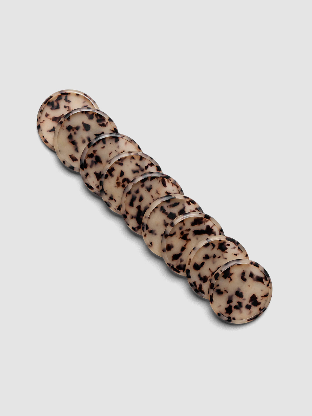 Plastic Planner Discs in the pattern Desert Tortoiseshell shown in 1.5" Inch sizing.
