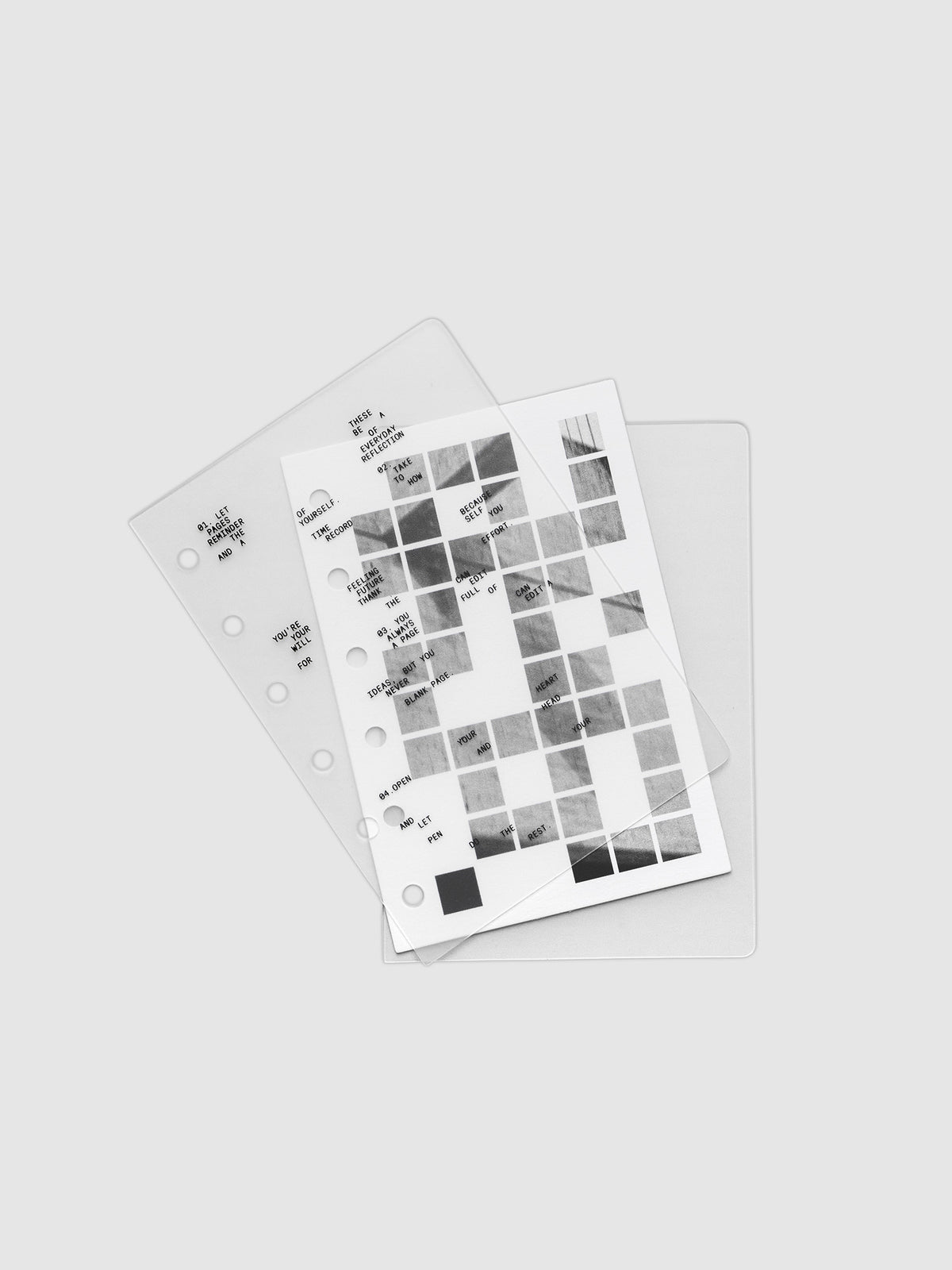 Clear planner cover with black printed text paired with a photographic black and white dashboard. Shown pre-punched for 6-ring planners in the size Pocket.