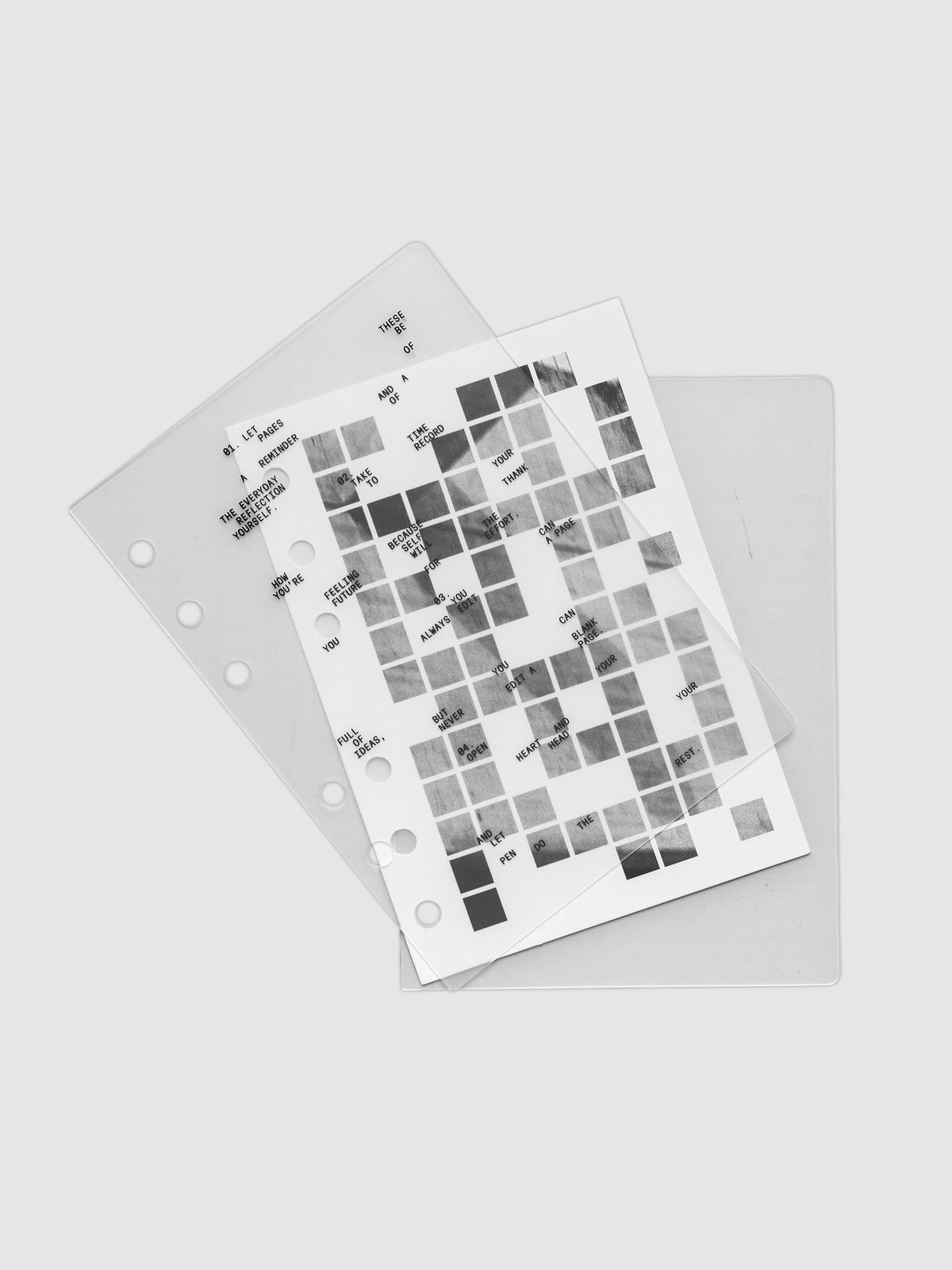 Clear planner cover with black printed text paired with a photographic black and white dashboard. Shown pre-punched for 6-ring planners in the size A6.