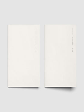Both 2027 Dated Travel Notebooks in A5 Slim size displayed side by side, showing the off-white covers with silver foil text for the Jan–Jun and Jul–Dec volumes