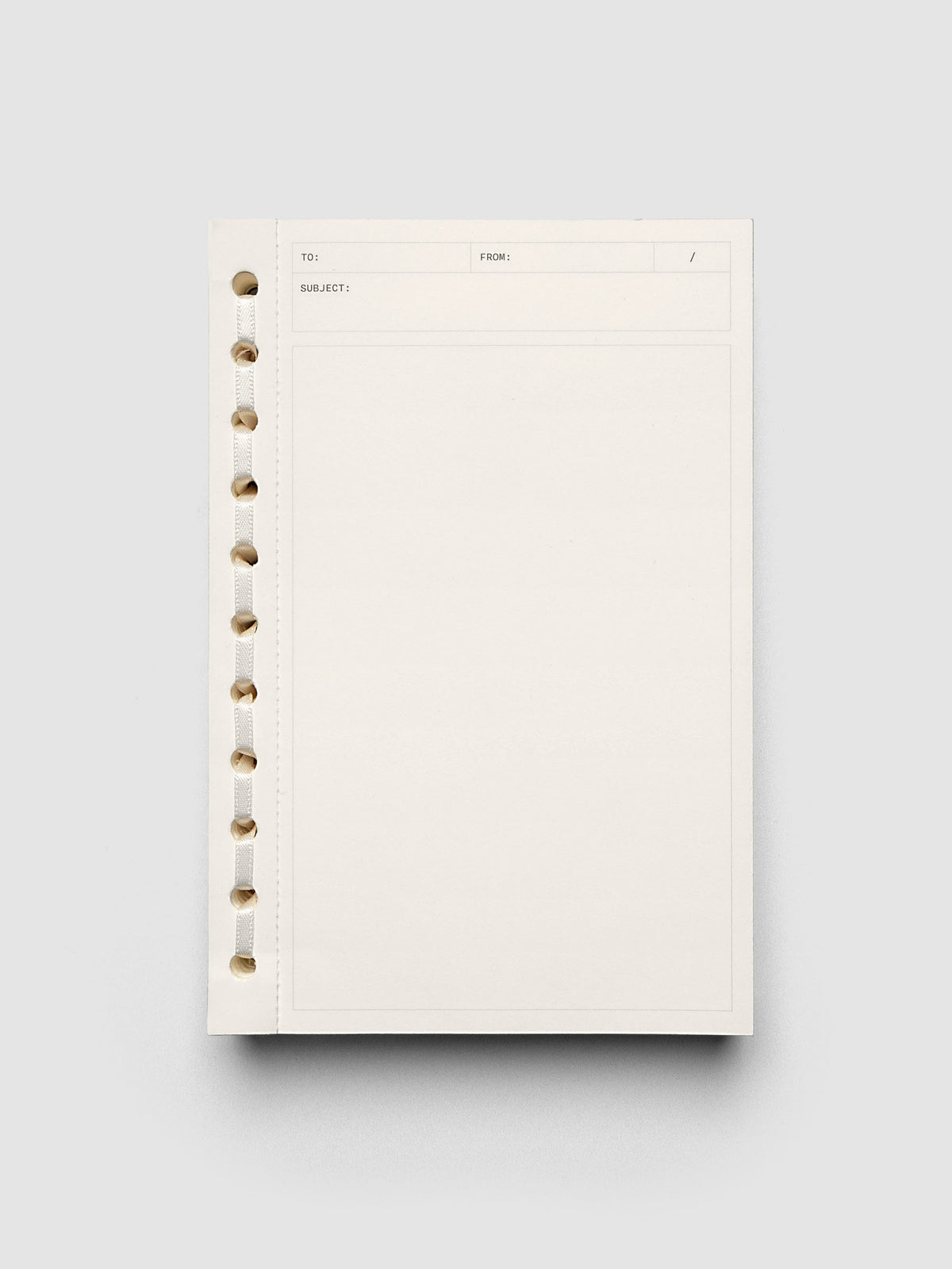 Cream paper tear away Message Pad with ribbon binding.