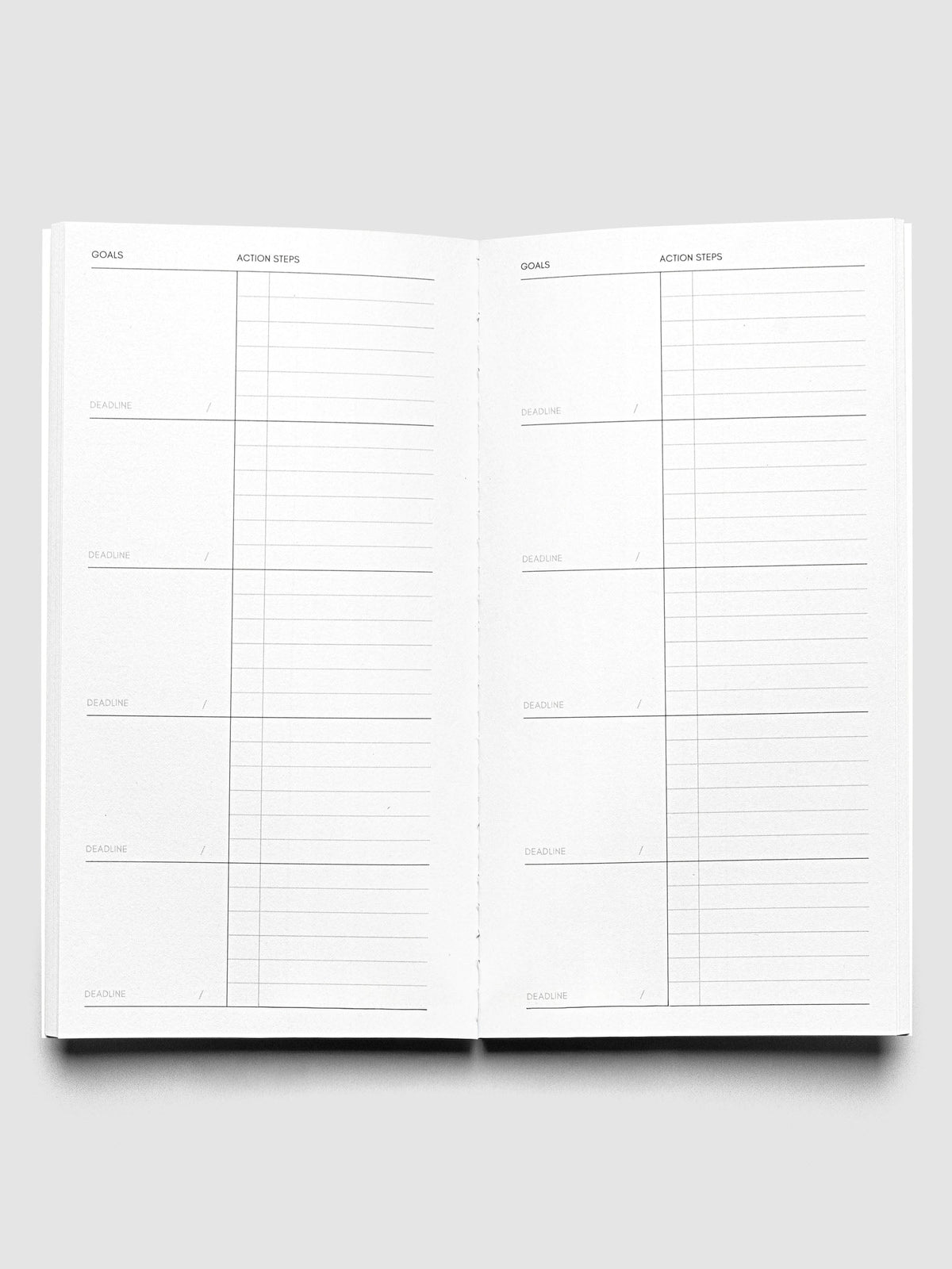 Interior of Travel Notebook in size Pocket Plus in color Ibiza with Goal Tracking pages.