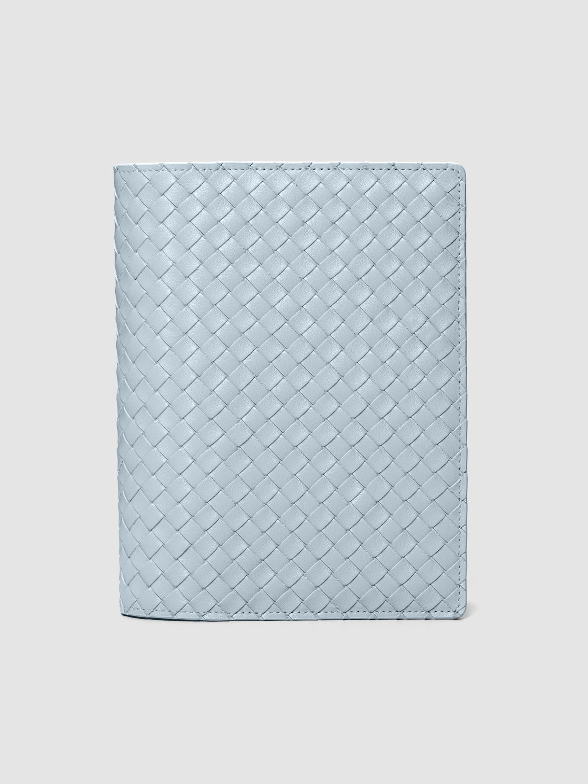 Blue genuine leather woven leather folio sized for Half Letter and A5 planners.