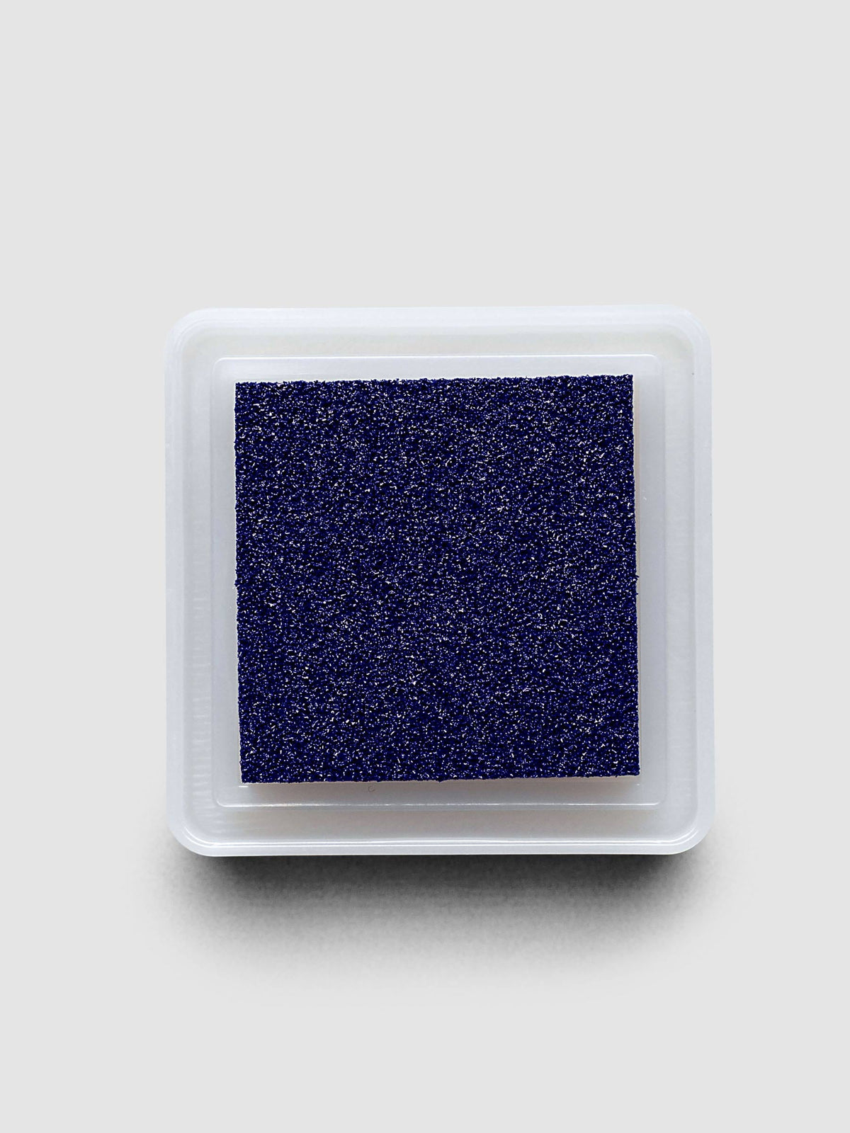 Artnic Stamp Ink Pad in indigo seen from the side with cover on
