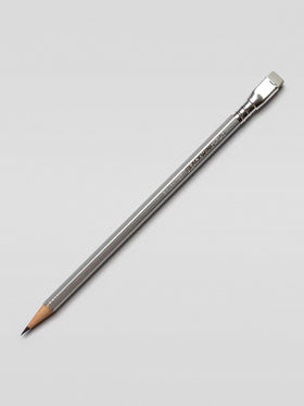 Single Blackwing 140 pencil placed diagonally on a light background, emphasizing the sleek, stainless steel-inspired barrel.