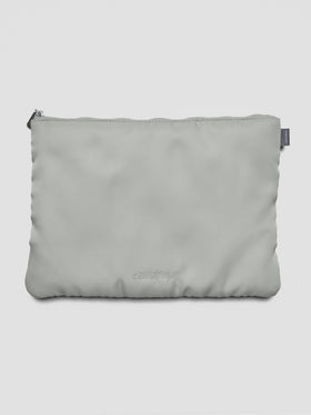 Light green-grey nylon, zippered, padded travel case.
