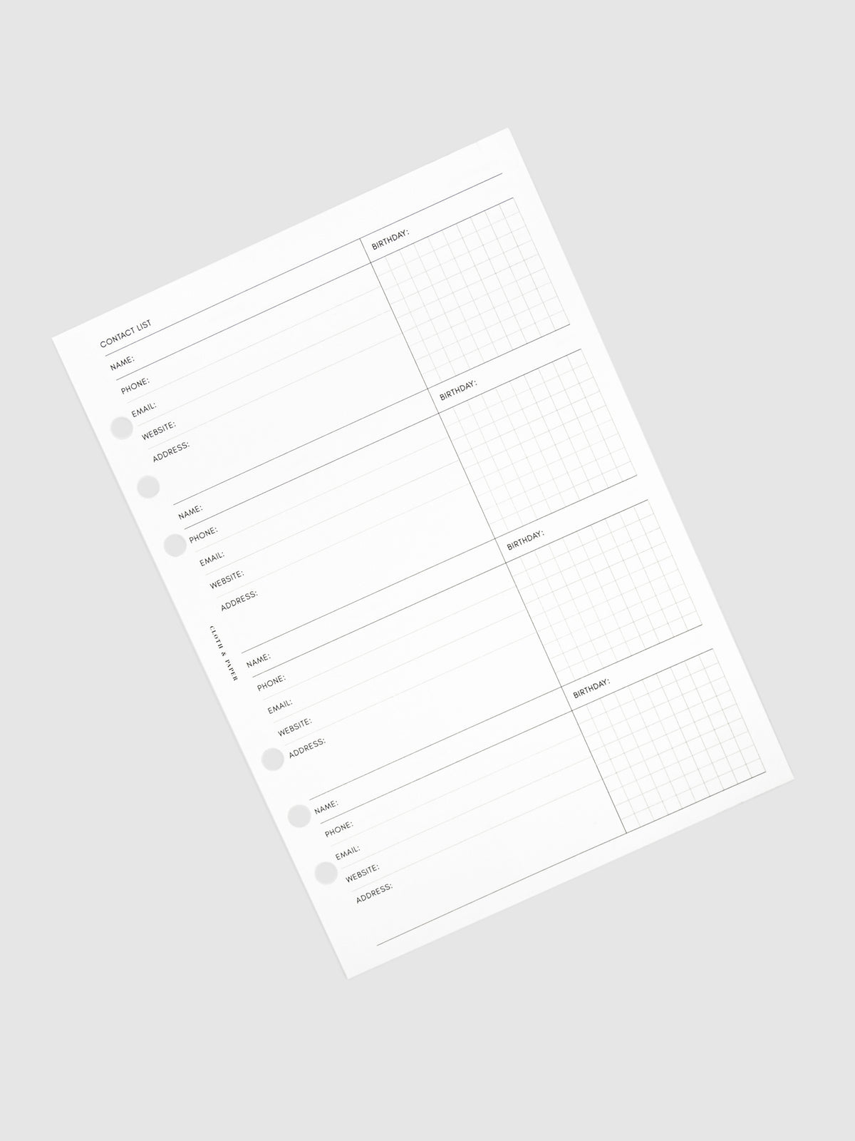 Stack of inserts turned to the left against a neutral background.