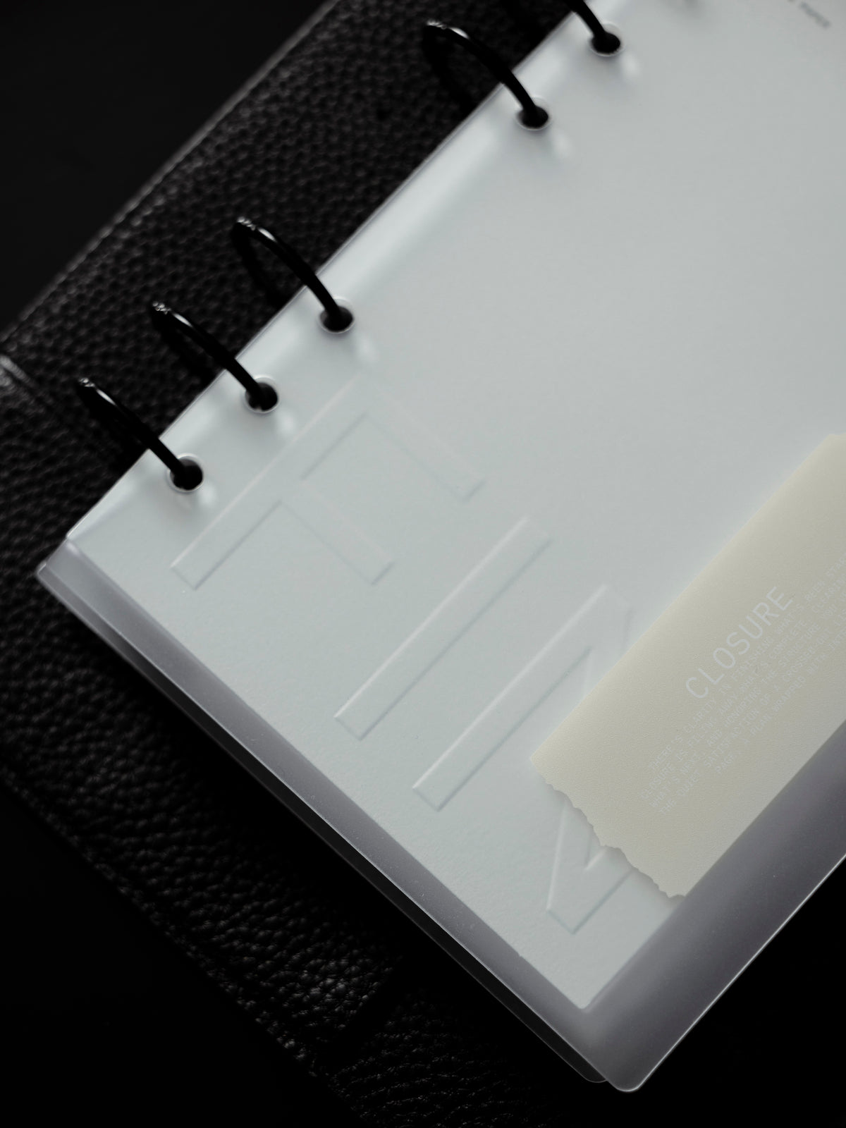 Close up of Closure Planner Dashboard + Cover Set against a black background.