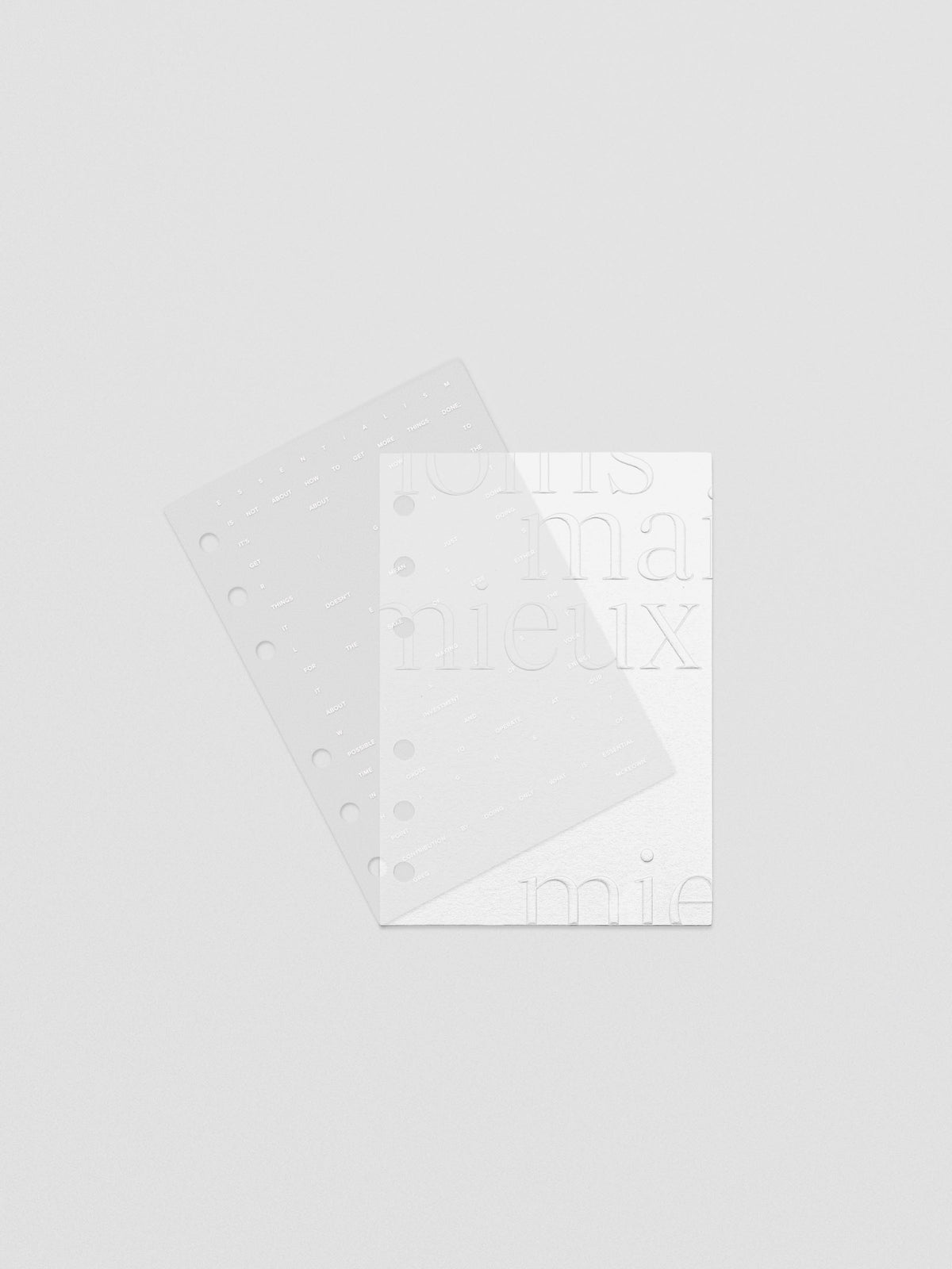 Essentialism Dashboard Duo reading "moins mai mieux" in size A6; layers shown offset.