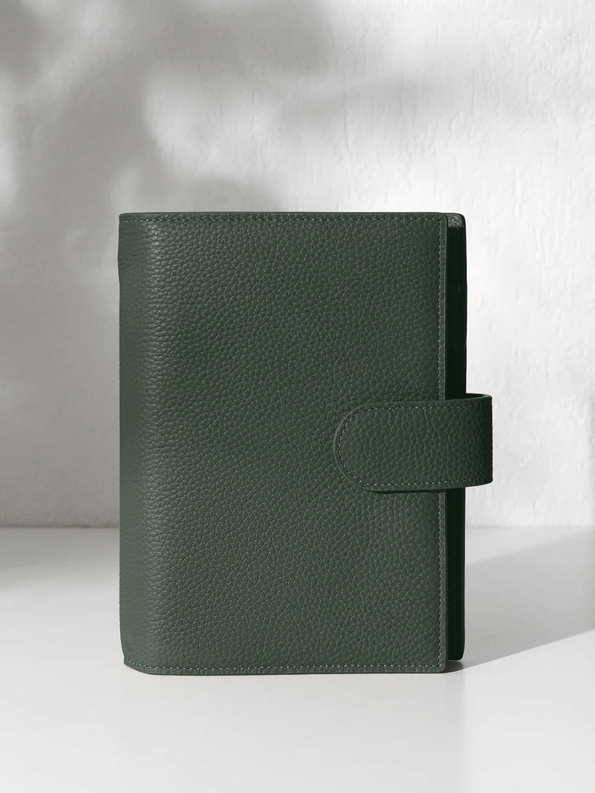 Cypress leather agenda displayed against a shadowed background.