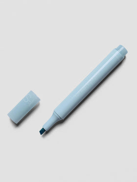 Half Sugar Highlighters shown in Blue with cap off beside the body of the highlighter.