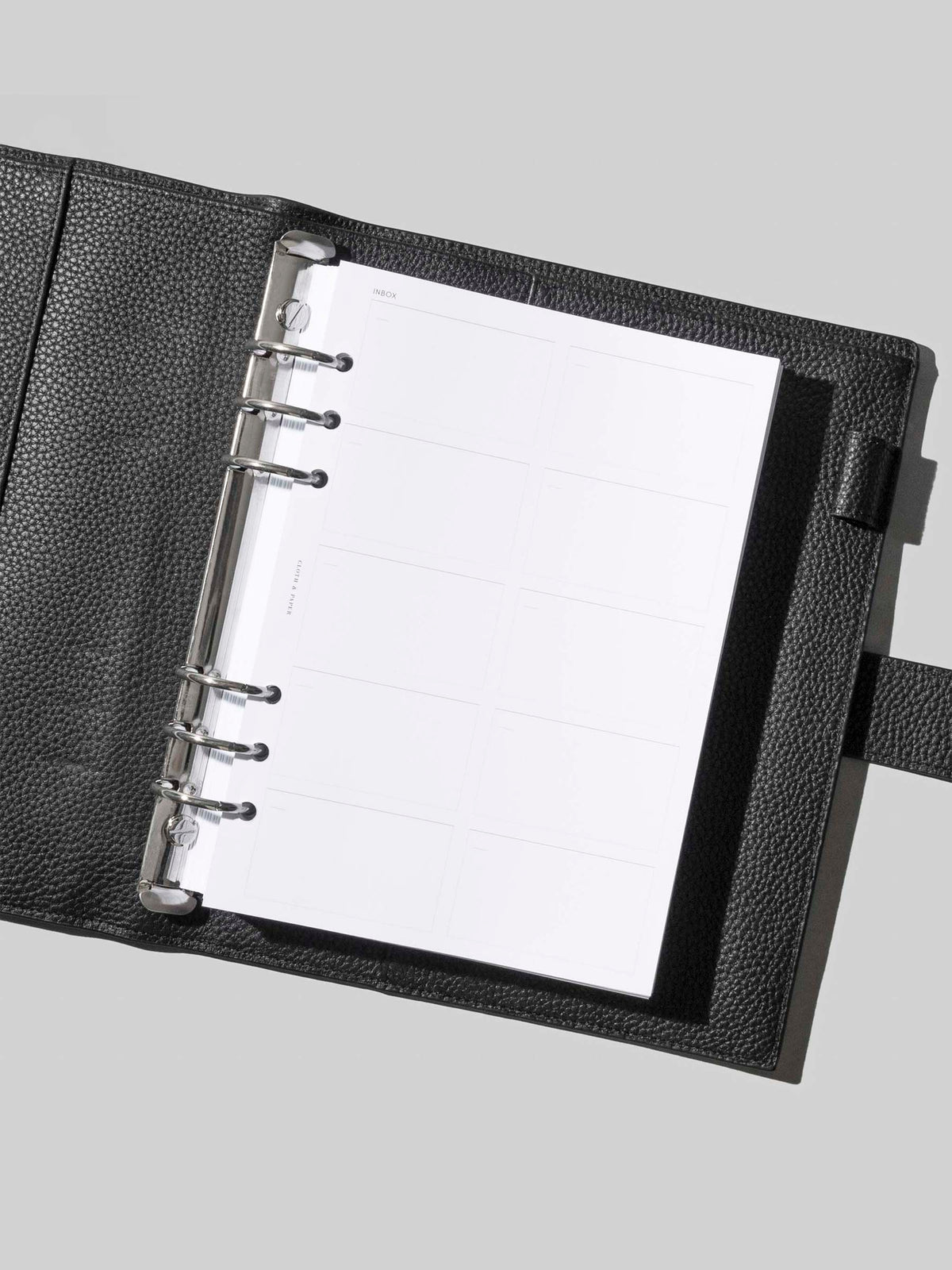 Insert in use inside an A5 leather agenda.