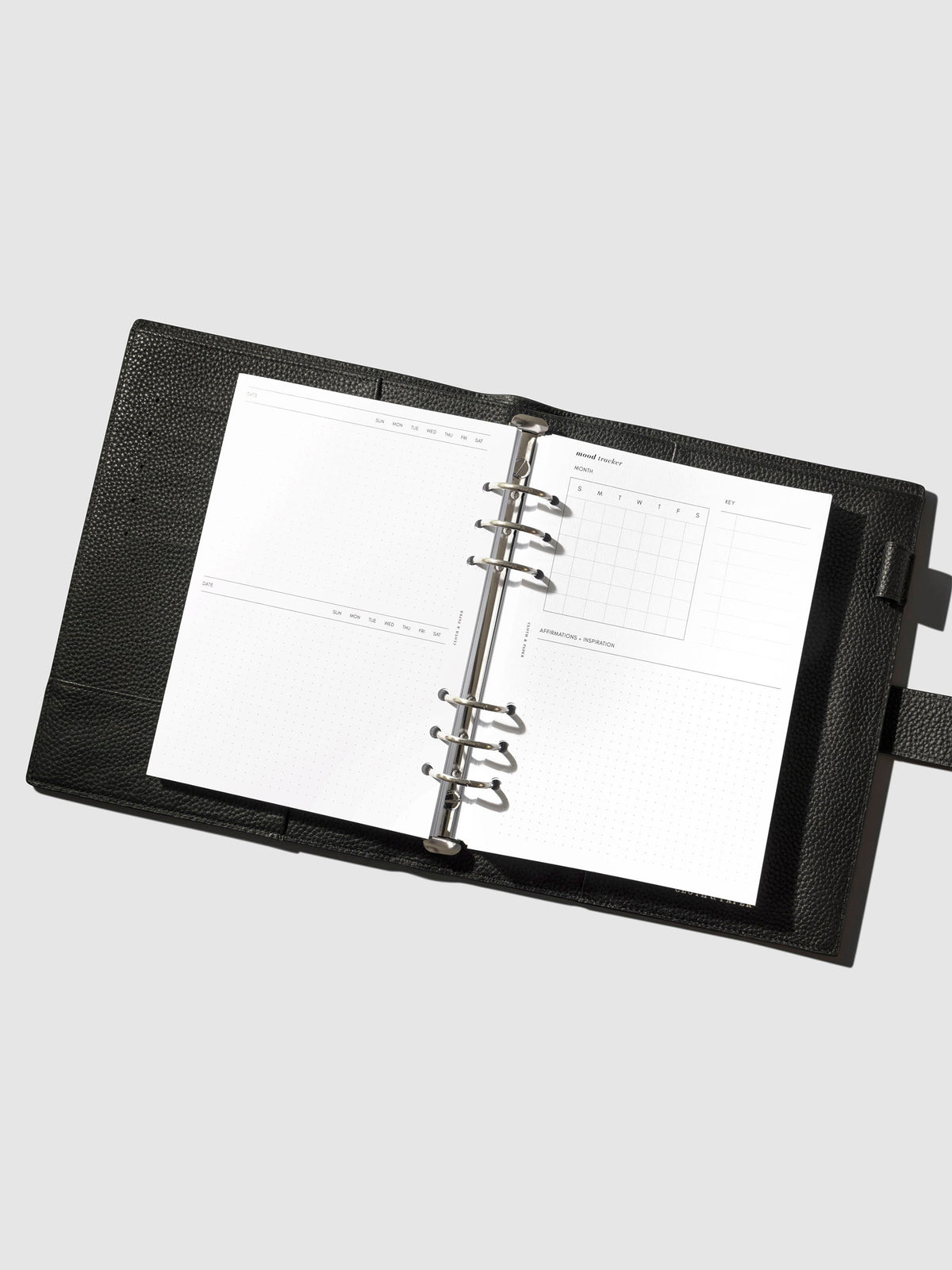 Inserts in use inside a leather planner.