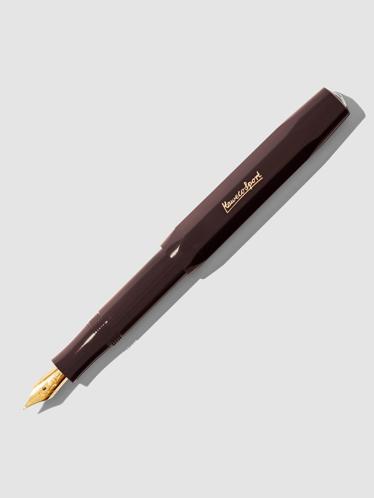 Kaweco Classic Sport Fountain Pen, Cloth and Paper. Burgundy Extra Fine Nib pen displayed on a neutral background.
