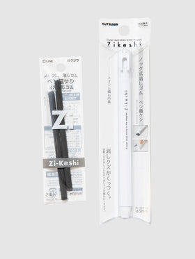 Kutsuwa HiLine Zikeshi Pen Type Eraser Refill, Cloth and Paper. Black eraser refills and the white eraser body they are meant to fill in their packaging. They are against a neutral background.