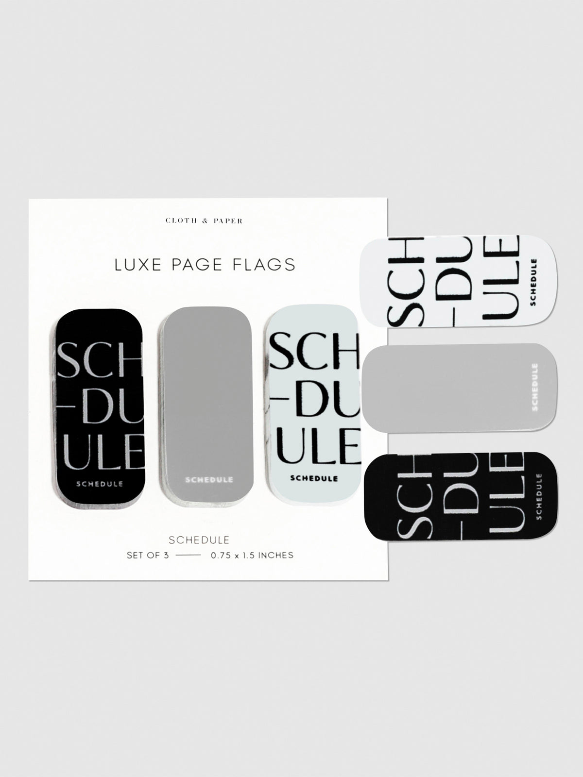Task page flags on their backings on a neutral background. One of each flag is stuck to the right side of the backing.